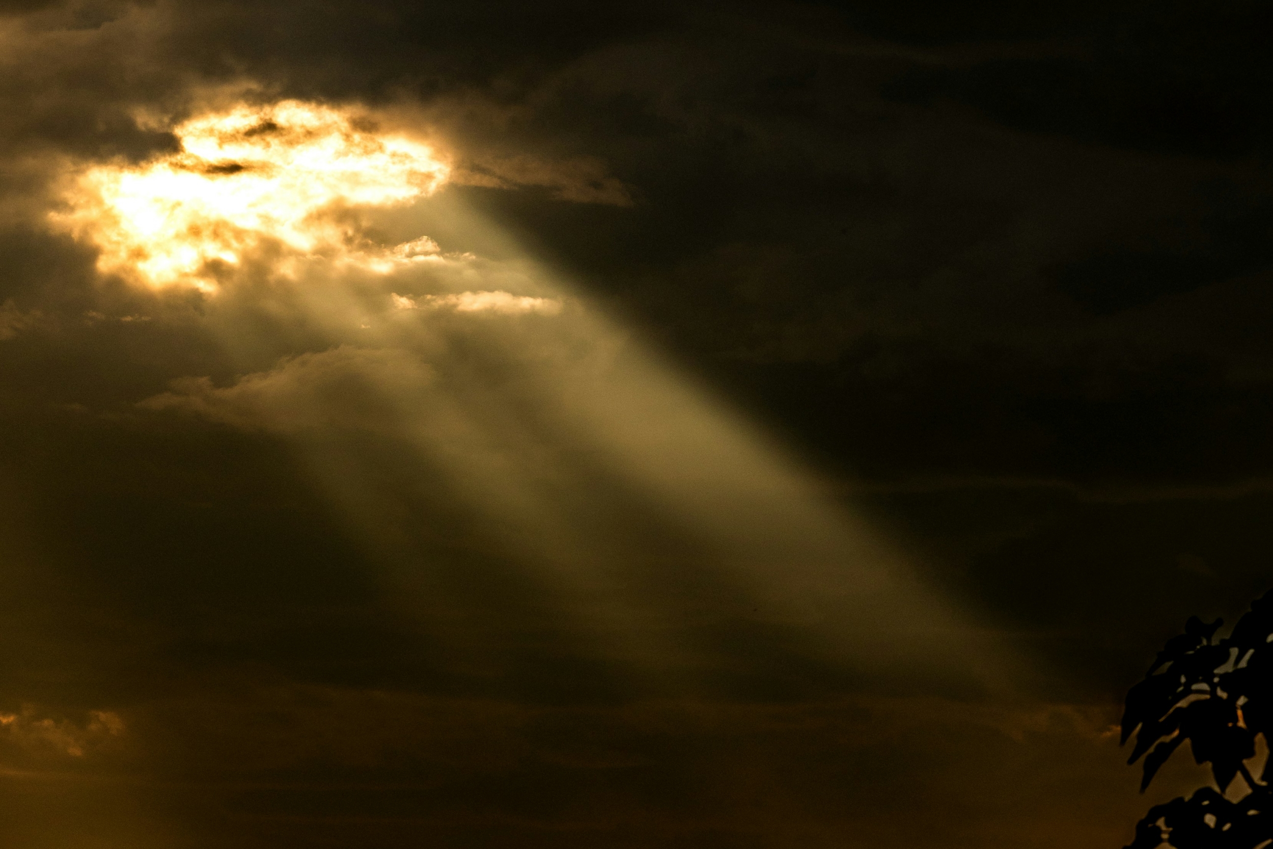 Sun rays breaking through a cloud